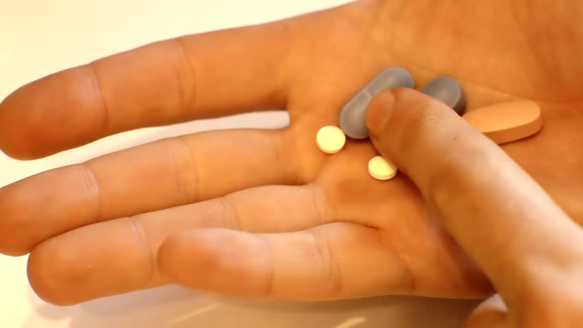 Medical Pills And Vitamin Capsules. Sorting Pharmacy Supplements For Treatment. Managing Daily Medication Dosage. Antibiotic Tablets. Pharmacy Industry. Daily Medicine. Painkiller Tablets Drugs Pills