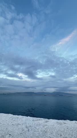 Goztepe coast and clouds, time-lapse video of clouds rising towards the sky from Goztepe coast in Izmir.