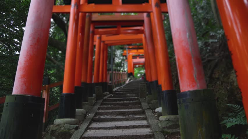 Fushimi Inari Taisha Shrine, Fushimi-ku, Kyoto Prefecture, Kansai region, Kyoto, Japan, Shinto shrine, mountain way with red torii gates tunnel, wooden torii path, fox sculptures, travel to Japan
