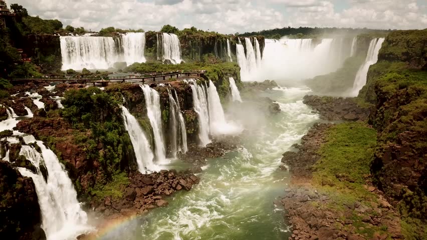 Iguazu Falls in Argentina - Brasil Border is one of the Natural Seven Wonders of the World and an UNESCO World Heritage Site. High quality 4k footage