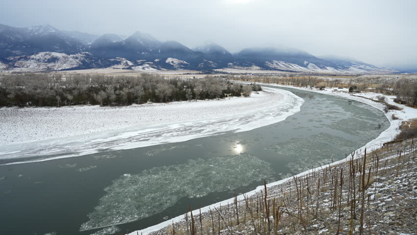 Pan downstream of Icy river below Montana Mountains