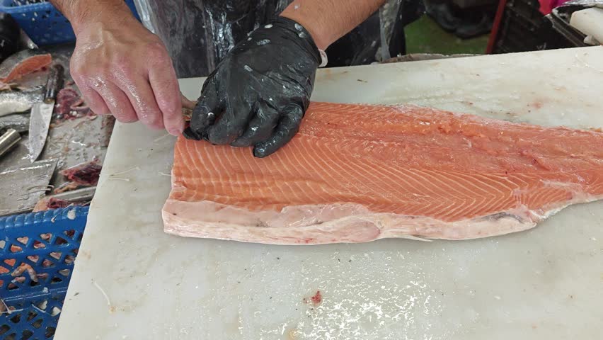 scene of the newly cut fresh Atlantic salmon fish at the wet market.

