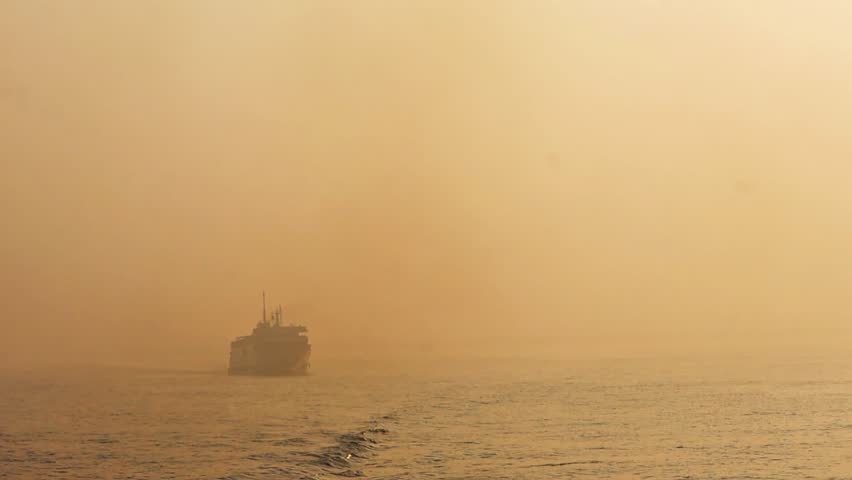 A ship at sunset time.