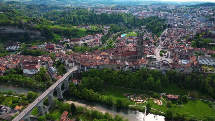 Aerial view around the city Fribourg in Switzerland on a sunny noon in summer.