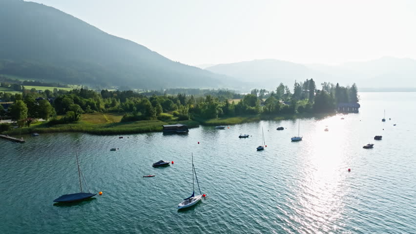 Aerial view of lake Wolfgangsee Austria. Boats moored in the lake in the alpine valley beautiful landscape of nature tourist Europe.