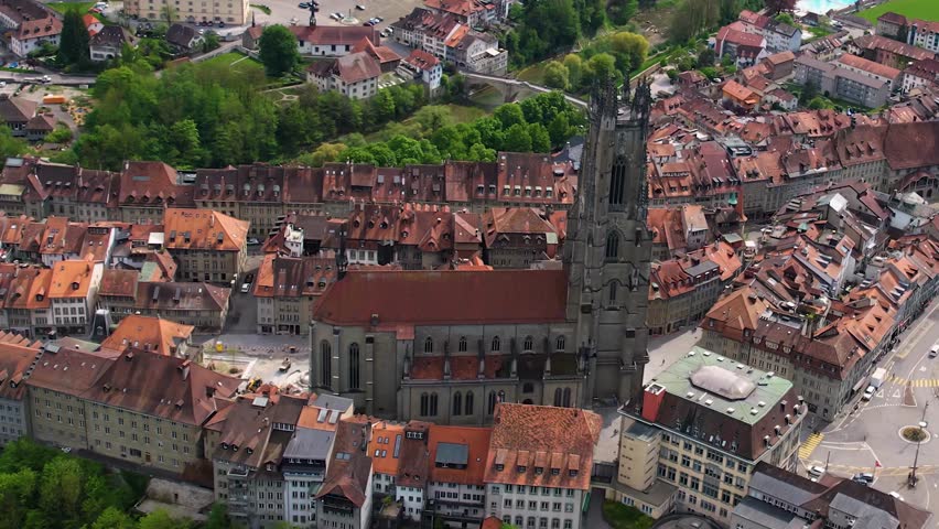 Aerial view around the city Fribourg in Switzerland on a sunny noon in summer.