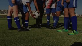 Animation of financial data processing over football players. Global sport and data processing concept digitally generated video. - Powered by Shutterstock - Get 15% off with code: PIKWIZARD15