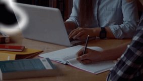 Animation of mathematical equations and data processing over diverse people using laptop. Global education, learning and digital interface concept digitally generated video. - Powered by Shutterstock - Get 15% off with code: PIKWIZARD15