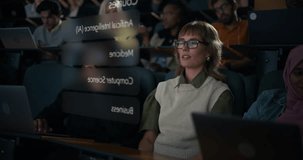 Female College Student With VR Glasses Uses Midair Gestures to Navigate an Ar Interface During a Packed Lecture. Visualisation of Holographic Anatomy and DNA Infographics . Edtech Immersive Learning. - Powered by Shutterstock - Get 15% off with code: PIKWIZARD15