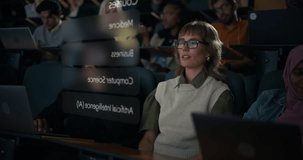 Female University Student With VR Glasses Uses AR Dashboard in Lecture Hall, Swiping Through Analytics Charts, Social Media Data, Course Menus. Immersive Edtech, Data Visualization, Smart Learning - Powered by Shutterstock - Get 15% off with code: PIKWIZARD15
