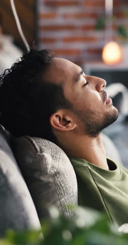 IV therapy, healthcare and man relax for infusion, supplements or immune system boost. Drip lounge, recovery and person rest with medical treatment, wellness vitamin c or mineral for detox benefits