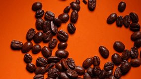 whole bean coffee rotating orange color background top down - Powered by Shutterstock - Get 15% off with code: PIKWIZARD15