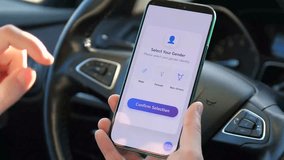 User selecting gender identity on a modern smartphone app. UI featuring male, female, and non-binary options. Inclusive design for social media, dating, or registration. High-quality footage for - Powered by Shutterstock - Get 15% off with code: PIKWIZARD15