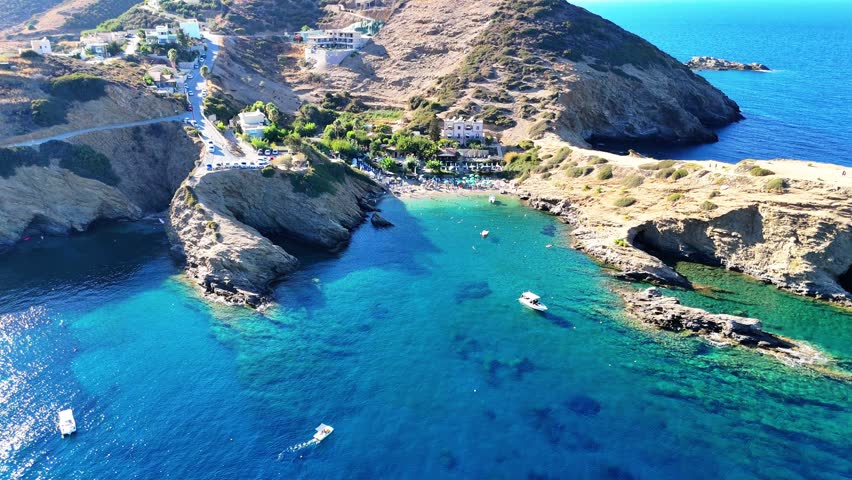 Aerial view of coastal landscape in Crete, Greece, featuring Mediterranean Sea, rocky shoreline and island scenery