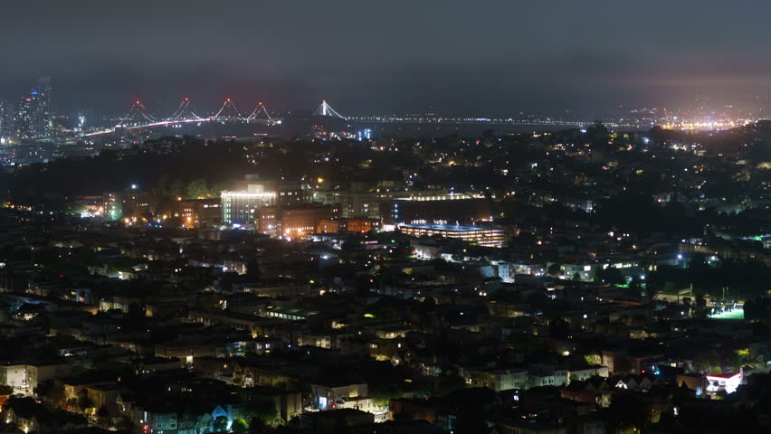 San Francisco Night Cityscape and Bay Bridge Time Lapse Pan L California USA