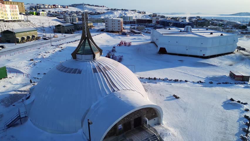 Drone flight over Iqaluit in Nunavut showing winter conditions in a remote Arctic community.