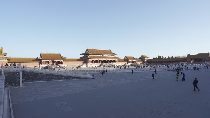 landscape view of square of Main building Hall of Forbidden City an ancient Chinese royal palace, world famous historical building in Beijing, China.Forbidden City with crowded people visiting