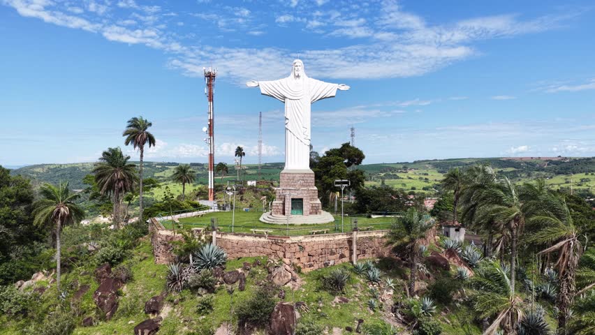 Christ The Redeemer Of Sao Jose Do Rio Pardo In Sao Paulo Brazil. Rural Tourism. Green Valley Landscape. Landmark Statue. Christ The Redeemer At Sao Jose Do Rio Pardo In Sao Paulo Brazil.