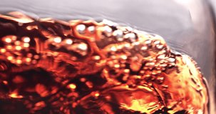 Slow Motion Amber Liquid Flowing With Light Reflections On Dark Background. Whisky, Rum Or Liqueur Texture, Luxury Alcohol And Cinematic Fluid Motion - Powered by Shutterstock - Get 15% off with code: PIKWIZARD15