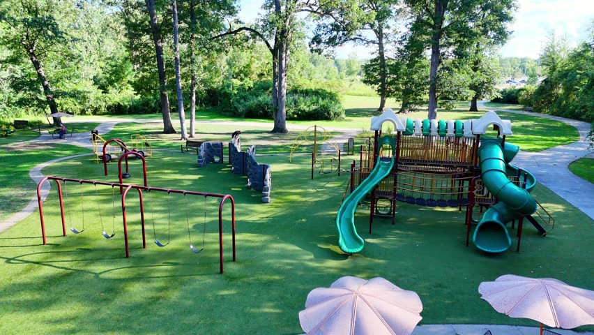 Playground equipment, swings, and slides in Prairie Creek Park, Brownstown, Michigan