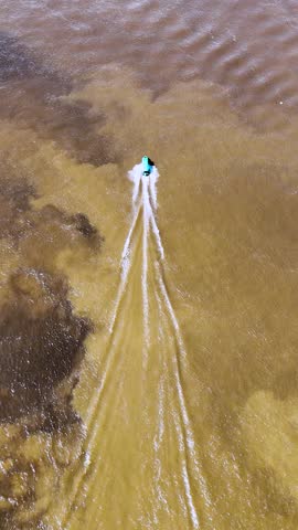 Famous Meeting of the Waters tourism landmark at Manaus Brazil. Brown Amazon river riverside Black Negro River with two different colors. Amazon Forest Brazil. Manaus Brazil.