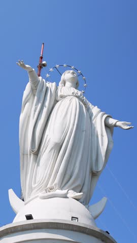 Low angle view of the virgin mary statue at the summit of san cristobal hill, santiago de chile