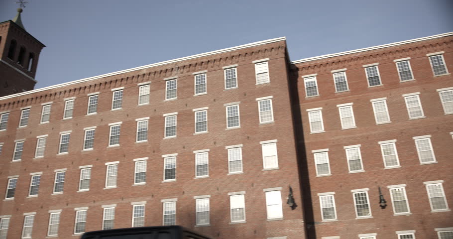 This is a shot of an historic red brick building the mill in manchester new hamshire. Built in the 1800s