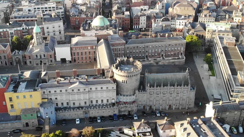 Beautiful aerial of Dublin Castle Tower, old town Dublin, Ireland. Sunset light. Heritage