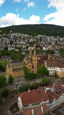 Neuchâtel town Switzerland historic Collegiate Church Collégiale de Neuchâtel aerial drone