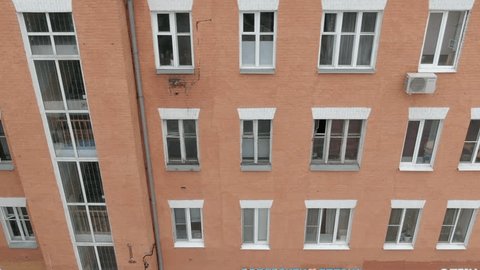 Drone Rotating Upward Front Building