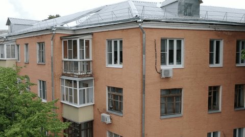 Diagonal Sideways Drone Flight near Residential Buildings