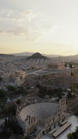 Acropolis Parthenon Odeon of Herodes Atticus amphitheatre Athens Greece aerial drone vertical video