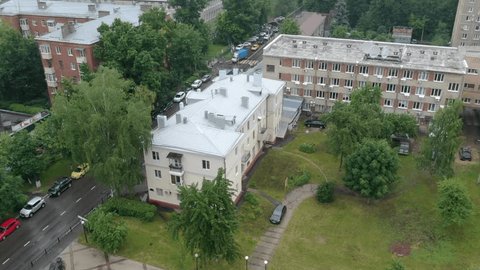 Drone Circling above Residential Courtyard