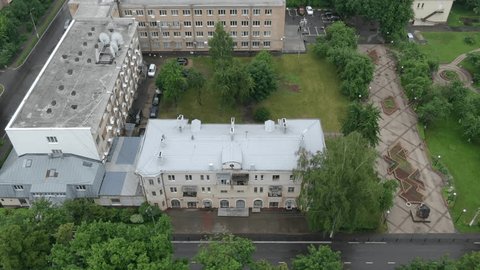 Drone Ascending Moving Away over Residential Area