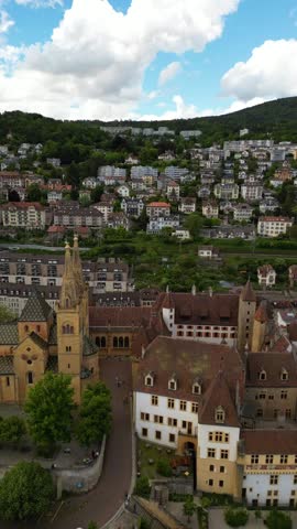 Neuchâtel medieval town Switzerland historic Collegiate Church Collégiale de Neuchâtel aerial drone