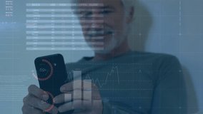 Animation of financial data processing over senior caucasian man using smartphone. Global technology, finances and digital interface concept digitally generated video. - Powered by Shutterstock - Get 15% off with code: PIKWIZARD15