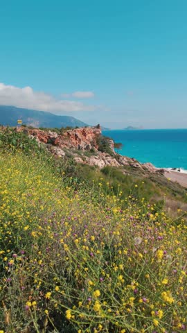 A scenic view of a beach  on Mediterranean coast of Turkey. Mediterranean beach during summer vacation. Nature view for summer vacation. 