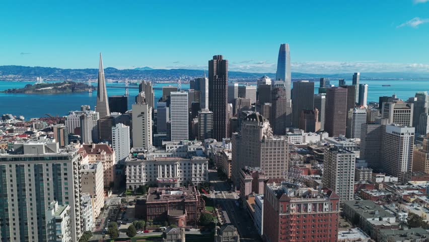 Wide panning aerial shot of the historic Nob Hill neighborhood on a perfect day in San Francisco, California. 4K