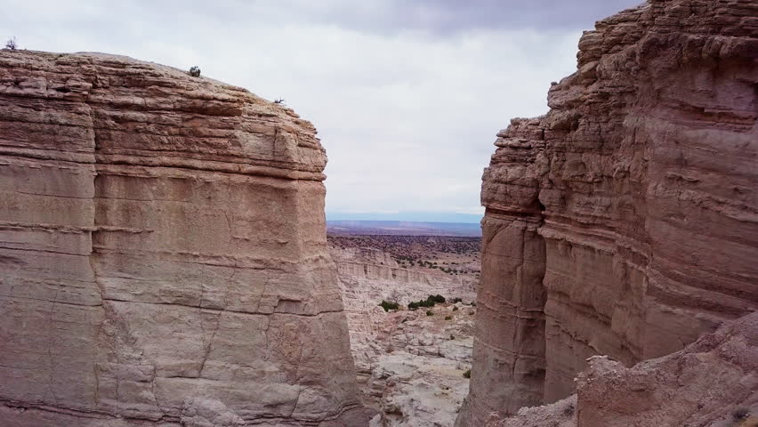 Desert canyon and landscape, drone aerial, 4K, Abiqui New Mexico, White Chapel Rocks National Park, White Rock Formation, American Southwest, USA
