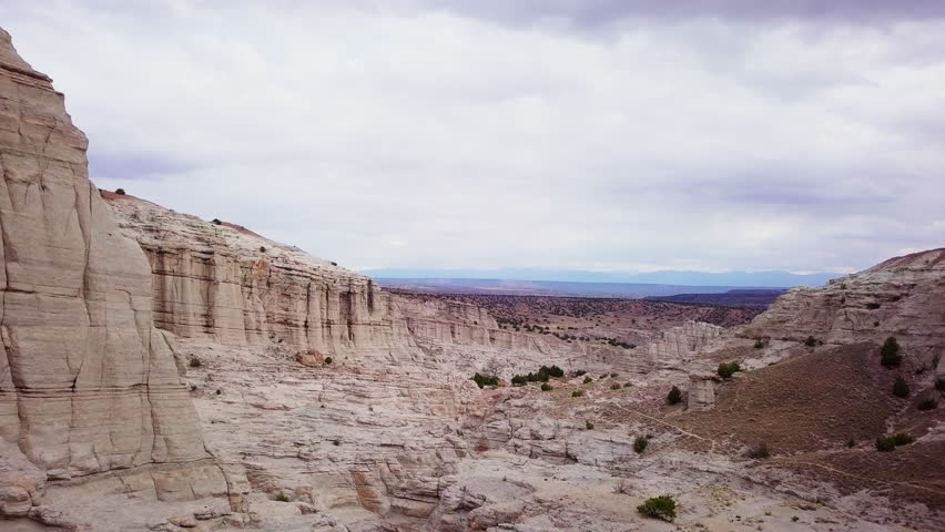 Desert canyon and  landscape, drone aerial, 4K, Abiqui New Mexico, White Chapel Rocks National Park, White Rock Formation, American Southwest