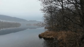 Mist over a lake in Lake District - Powered by Shutterstock - Get 15% off with code: PIKWIZARD15
