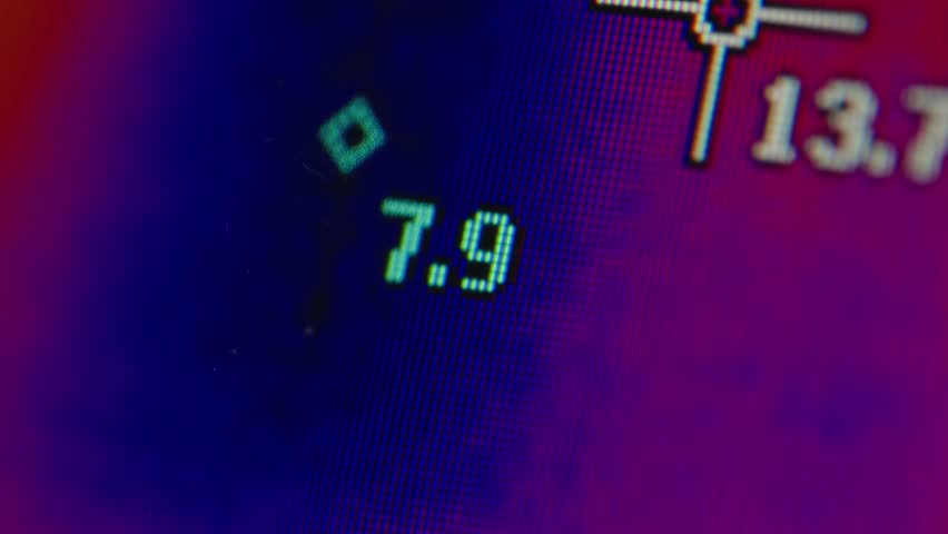 Man technician uses a thermal camera scope to detect heat loss. Engineer using imaging camera diagnosis checking space and people.