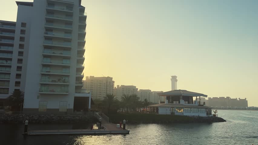 Stunning sunset view over residential buildings in the Jumeirah Palm, Dubai, no logos