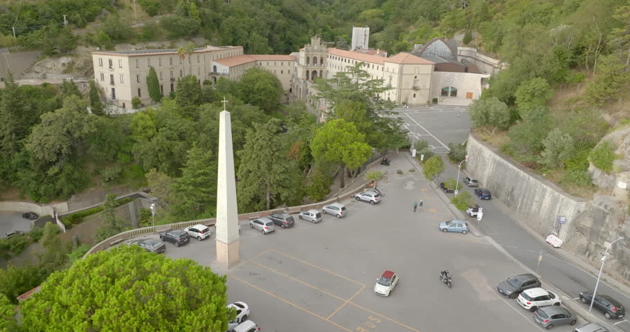 Aerial view of the Catholic sanctuary of San Francesco da Paola, in the province of Cosenza, Calabria, Italy. It is a pilgrimage site and minor basilica. In foreground there is a white stone obelisk.
