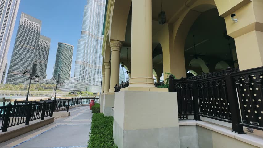Panoramic view of modern skyscrapers and traditional architecture in Dubai downtown, no logos