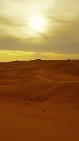 Beatiful landscape in Sahara desert at sunset, zoom in timelapse. Vertical video