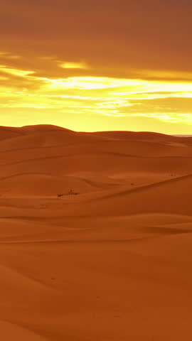 Beatiful landscape in Sahara desert at sunset, timelapse. Vertical video