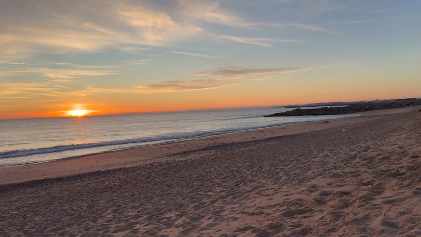 Amazing sea landscape. Dramatic sea sunset. Burning sky and shining golden waves. Summer sunset seascape. Atlantic ocean beach sunsets. Seascape background. Tourism, travel, holdiay, summer concept.