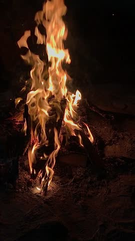 A crackling bonfire on a snowy winter night.🔥