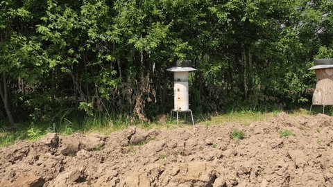 Low Drone Flight over Plowed Field near